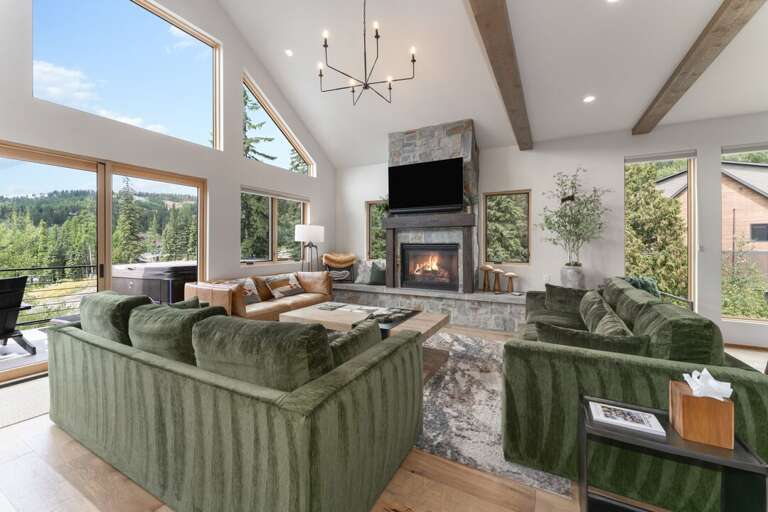 Enjoy family time around the fireplace and watch a movie | Main Level