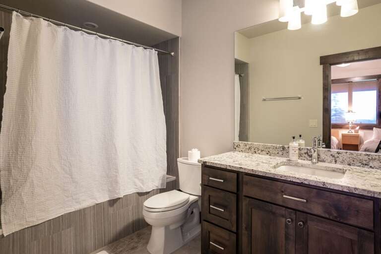 Enjoy the ensuite bathroom | Lower Level