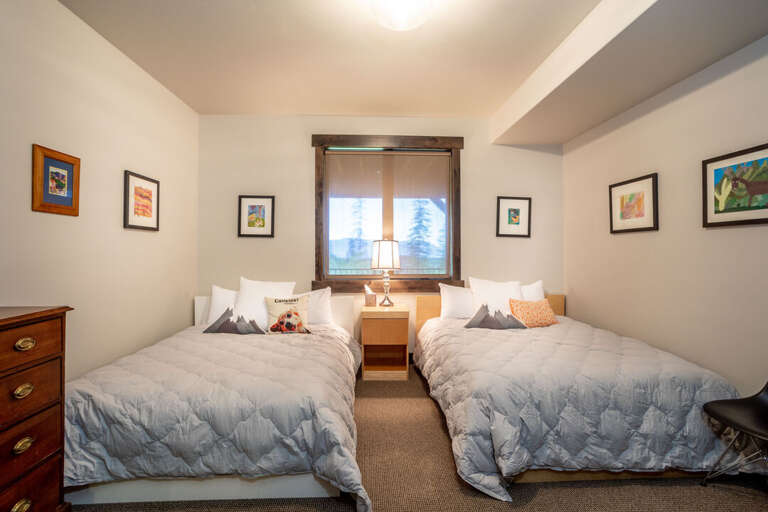 Sleep in | Two Queen-sized beds | Lower Level