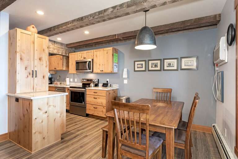 Gather round the dining table for a delicious meal | Main Level