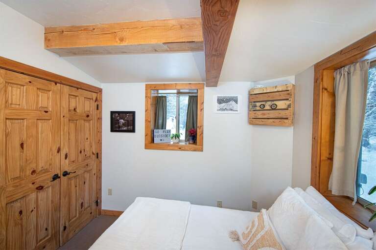 The ground floor guest bedroom is a beautifully decorated, comfortable space | Lower Level