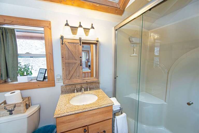 The master bathroom with walk-in shower | Upper Level