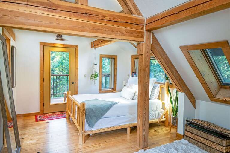 The master bedroom skylights bathe the room in natural lighting | Upper Level