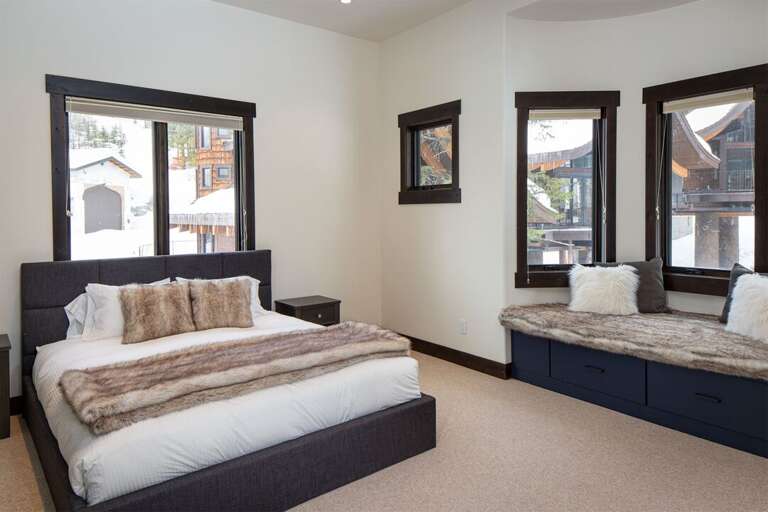 Bedroom 3 features a king size bed & built-in window seat | Main Level