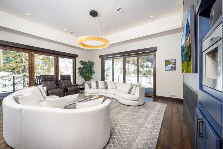 Take in panoramic mountain views from the accordion style doors that frame the main living area of the home | Main Level