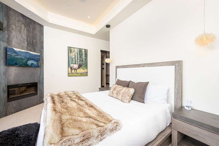 Relax after a day of adventure in the luxurious master suite | Main Level
