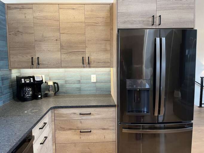 Updated Appliances with a Modern Backsplash | Upper Level
