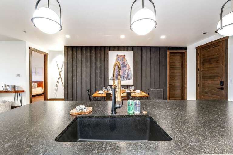 Waterfall kitchen island that comfortably seats four | Main Level