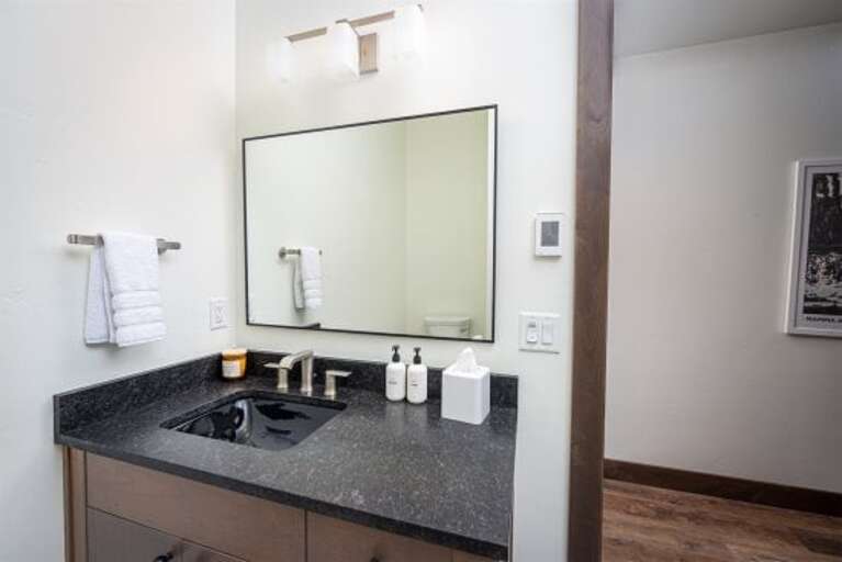 Prepare for a day of adventure in the private ensuite | Main Level