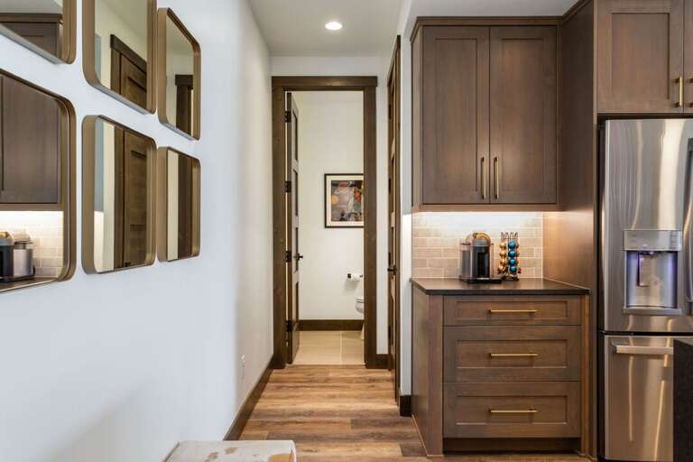 The half bathroom and laundry is this way!