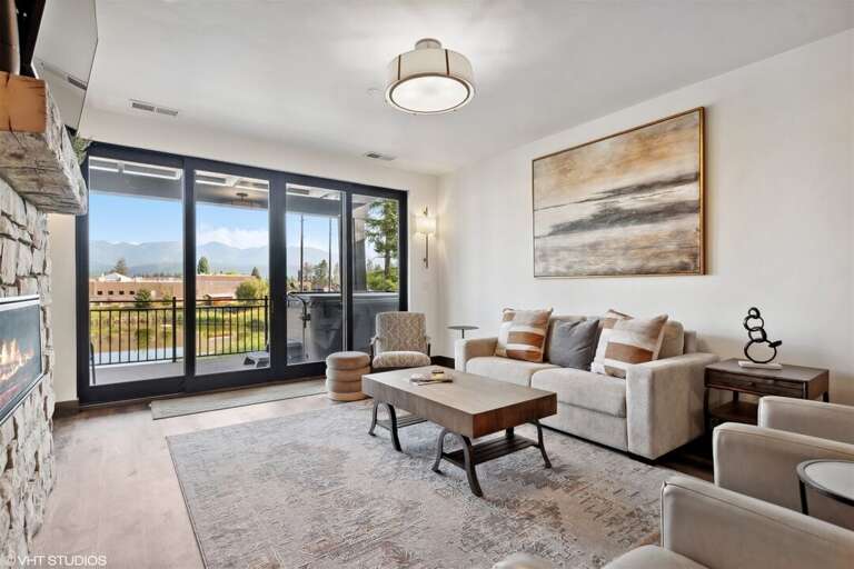 Access the homes patio from the living room and expand the living space into the great outdoors | Main Level