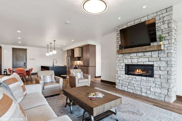 The homes gas fireplace creates a warm, relaxing environment | Main Level