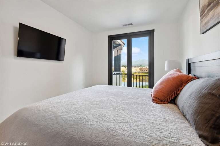 Relax and be refreshed in the home's primary suite | Main Level