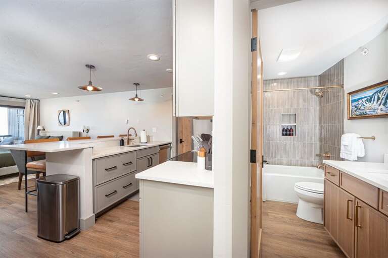 The home's full bathroom is a spa-like retreat after a day of adventure | Main Level