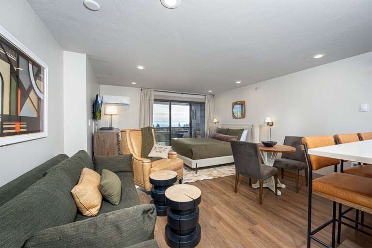 The home's sofa is a pullout with an additional queen bed | Main Level