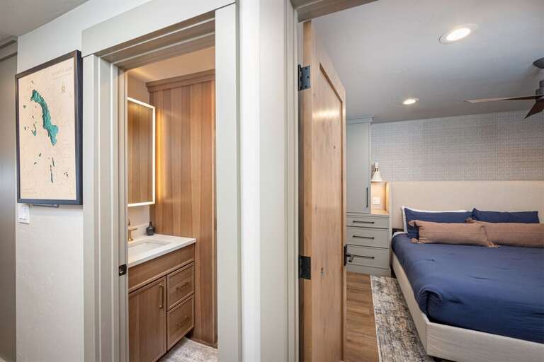 The bathroom is conveniently adjacent to the bedroom | Main Level