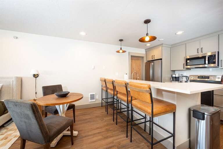 Additional seating is available at the spacious kitchen bar | Main Level