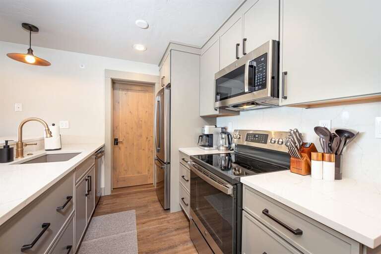 The kitchen connects both units | Main Level