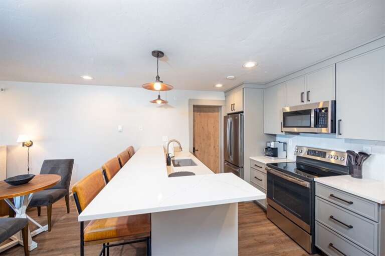 The kitchen connects both units | Main Level