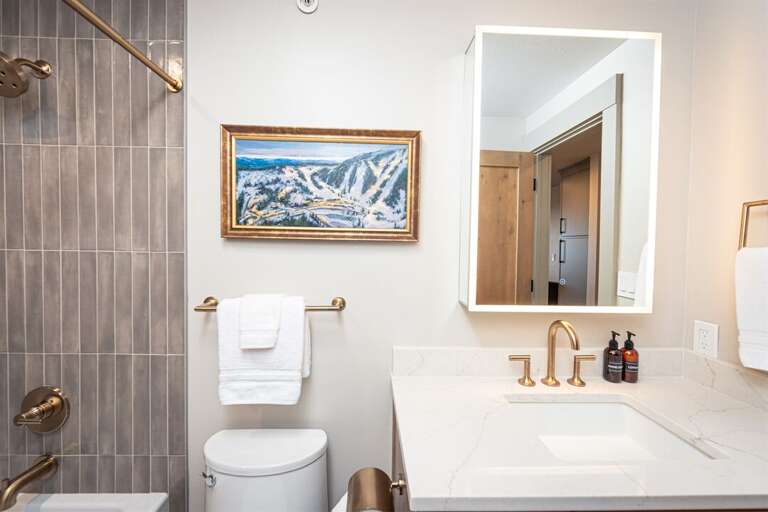 Get ready for the day with ease in the luxurious full bathroom | Main Level