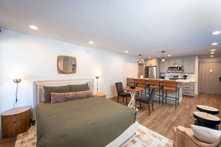 Relax and recharge in the comfortable queen bed | Main Level