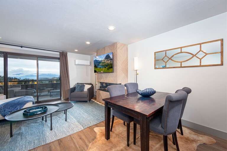 Share a meal and take in the mountain views from the dining area | Main Level
