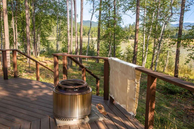 Enjoy cozy nights outside by the fire pit | Exterior