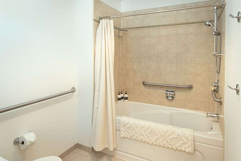All 3 full bathrooms feature oversized bathtubs | Main Level