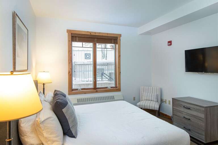 Bedroom 2 offers an oversized ensuite with a shower & bathtub combination | Main Level