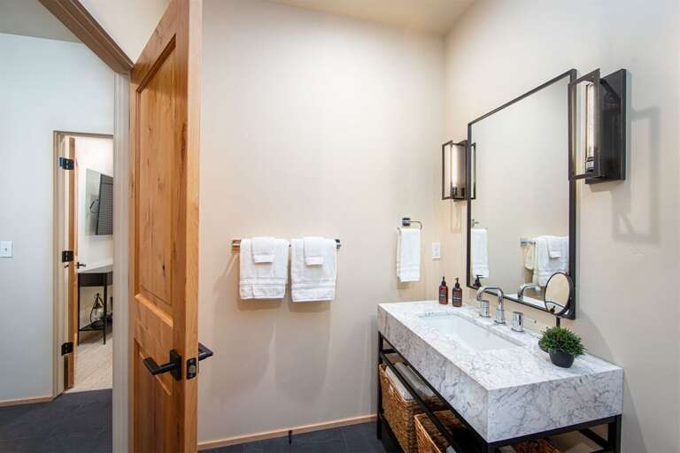 The main floor full bath serves Bedrooms 2 & 3 | Lower Level