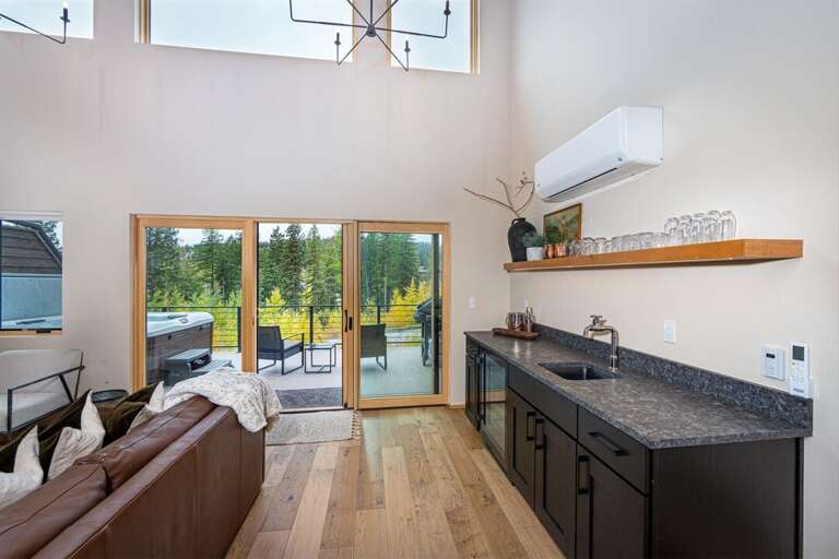 The wine bar serves the main living space of the home | Middle Level