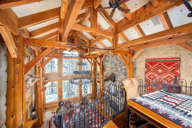 Custom architecture and metal work are featured throughout the home | Upper Level