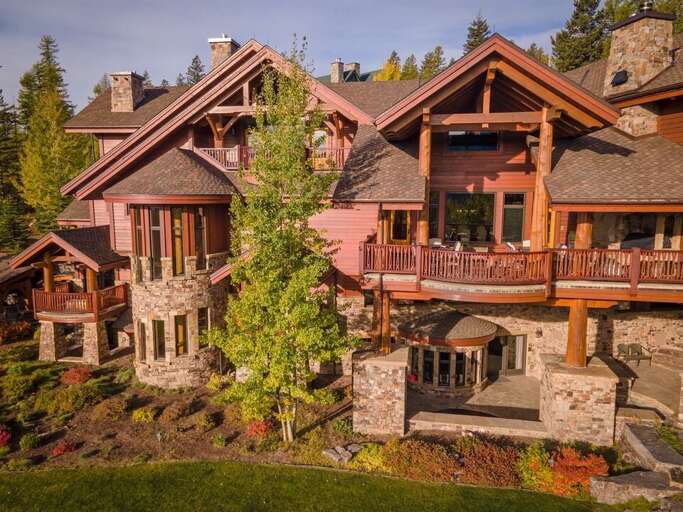 Custom architecture, woodwork & stonework make Northern Lights Lodge a one-of-a-kind luxury mountain getaway | Exterior