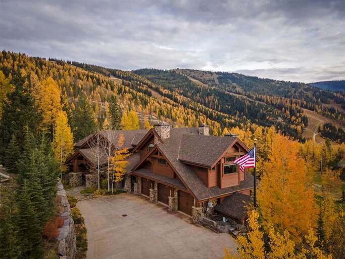 Custom architecture, woodwork & stonework make Northern Lights Lodge a one-of-a-kind luxury mountain getaway | Exterior