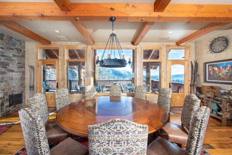 Enjoy a memorable meal together in the dining area with breathtaking views | Main Level