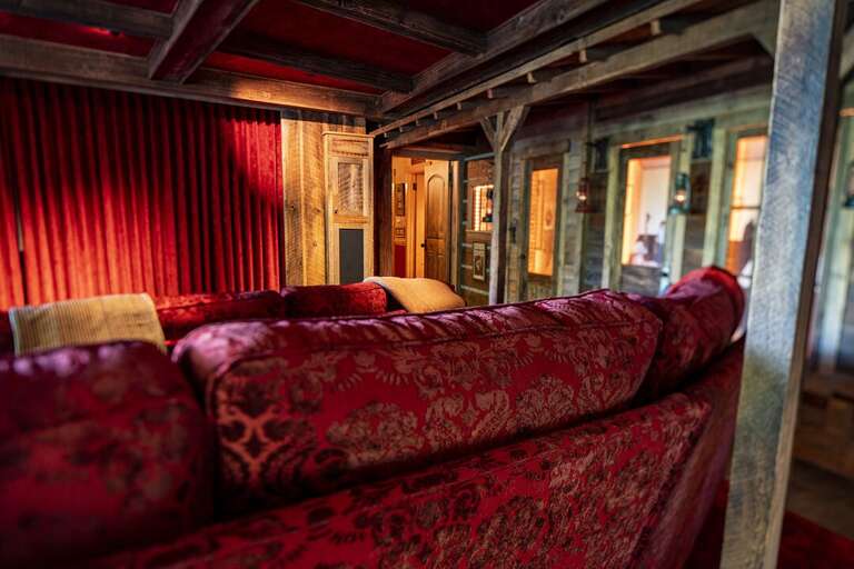 Have a one-of-a-kind movie night in your private theater room | Lower Level