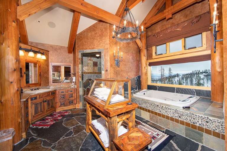 Take in the mountain views as you relax in the jetted tub and unwind from your day of adventure | Upper Level