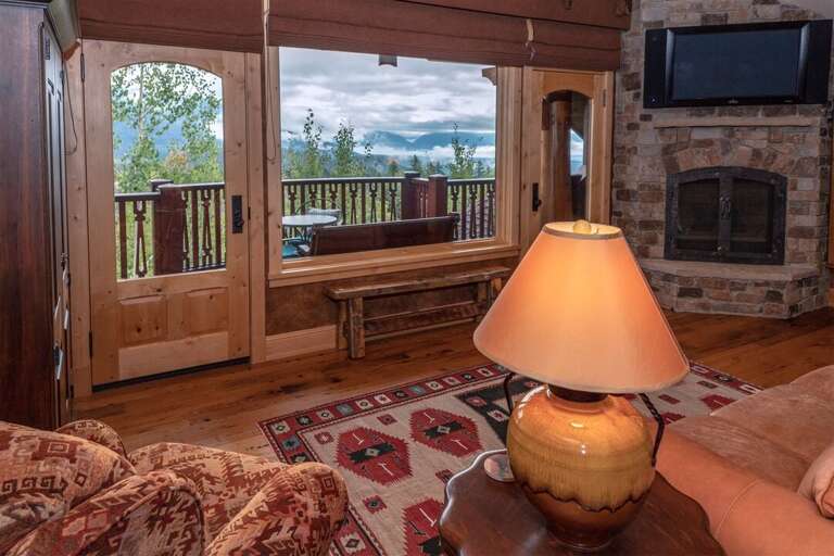 Views of Whitefish Mountain and private patio access | Upper Level