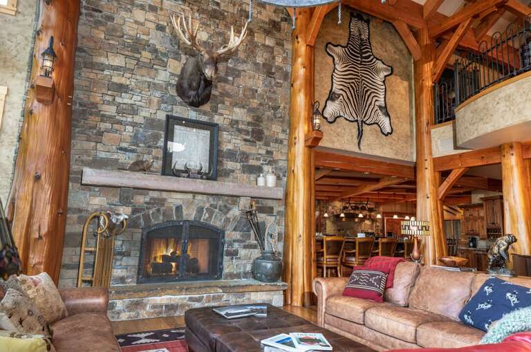 Warm up by the fireplace after a day on the slopes | Main Level