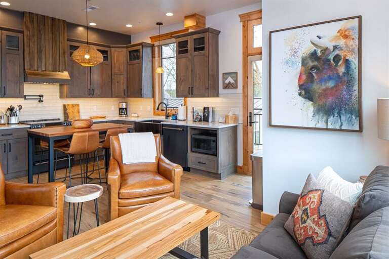 The open concept living space is inviting and a comfortable space for your group to connect | Main Level