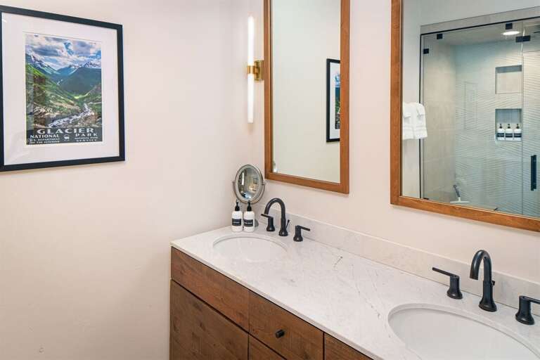 The master ensuite has a double vanity & spa-like steam shower | Main Level The master ensuite has a double vanity & spa-like steam shower | Main Level