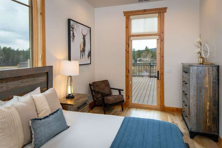 Take in expansive views from the patio accessible from Bedroom 2 | Main Level