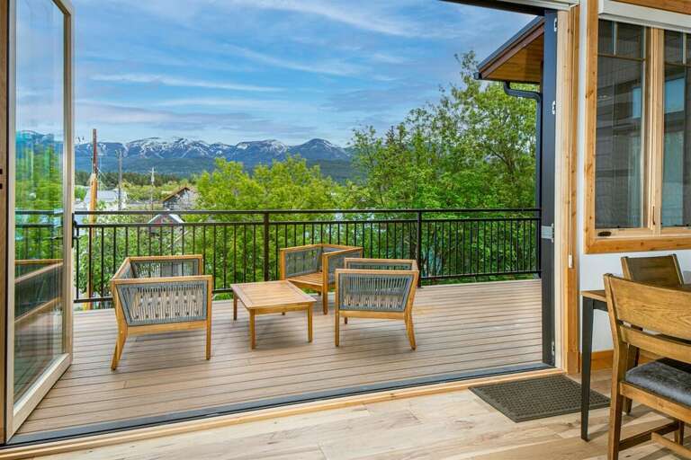 Relax after a day of adventure on the patio with incredible views of Big Mountain | Exterior