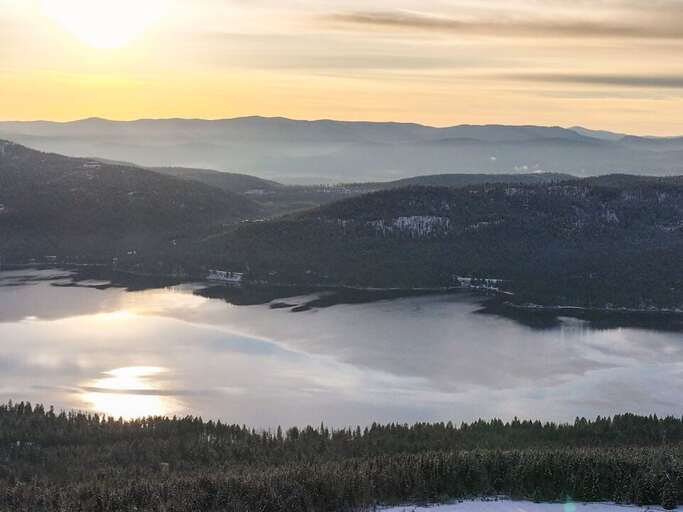 Aerial view of fog over Whitefish Lake | Exterior Aerial view of fog over Whitefish Lake | Exterior