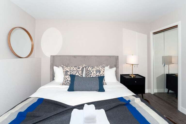 Nice mirrored closet doors in main bedroom | Lower Level Nice mirrored closet doors in main bedroom | Lower Level