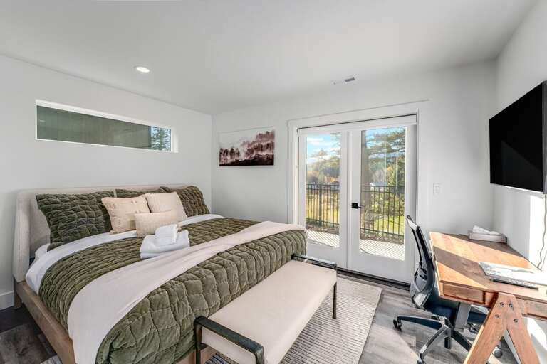 Master Bedroom (Main Level)- King Bed, Desk Area and Outdoor Access