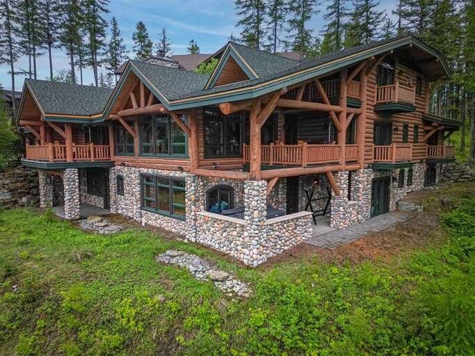 Built in a classic log home style, Ridge Top Lodge is a picturesque setting for a Montana getaway | Exterior Built in a classic log home style, Ridge Top Lodge is a picturesque setting for a Montana getaway | Exterior