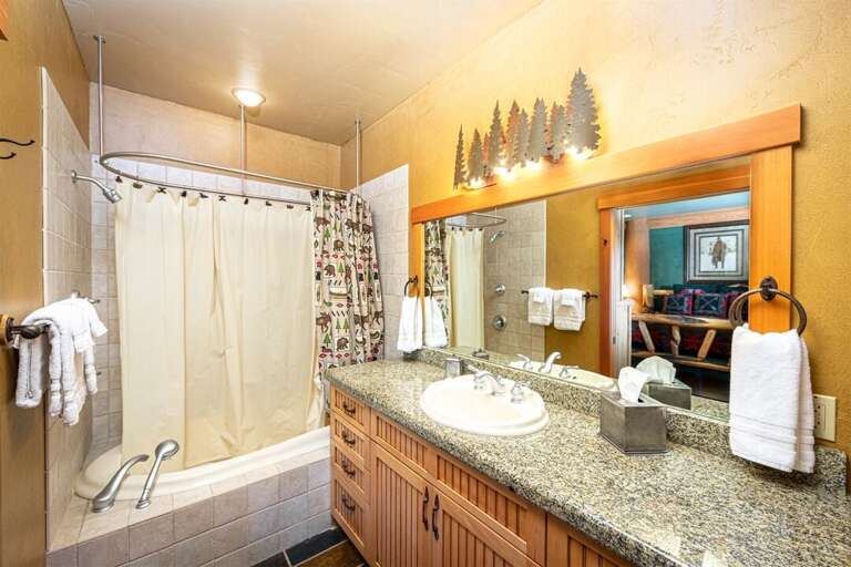 Each king bedroom offers its own private ensuite | Main Level Each king bedroom offers its own private ensuite | Main Level