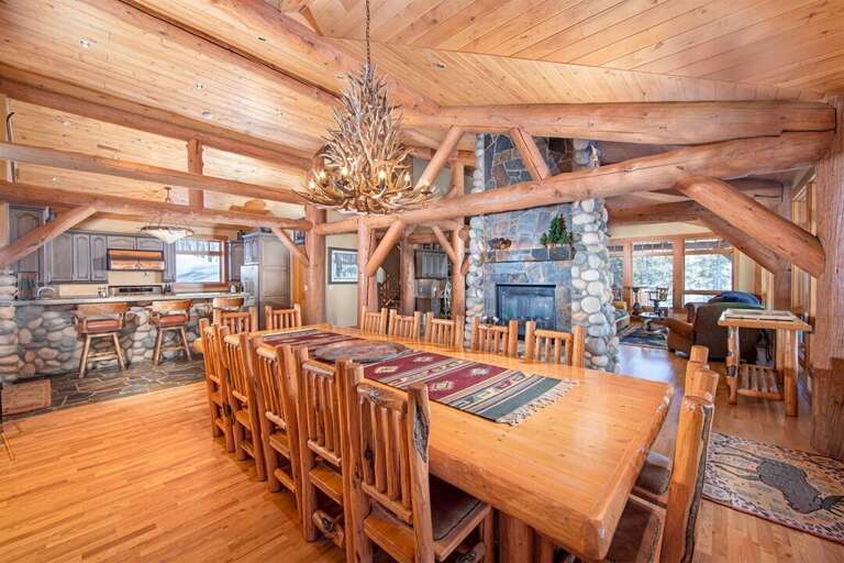 The main gathering space of the home has an incredible rustic log home aesthetic | Main Level The main gathering space of the home has an incredible rustic log home aesthetic | Main Level