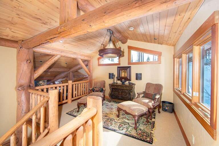 Just outside the master suite is a private sitting area - great for relaxing with a good book | Upper Level Just outside the master suite is a private sitting area - great for relaxing with a good book | Upper Level